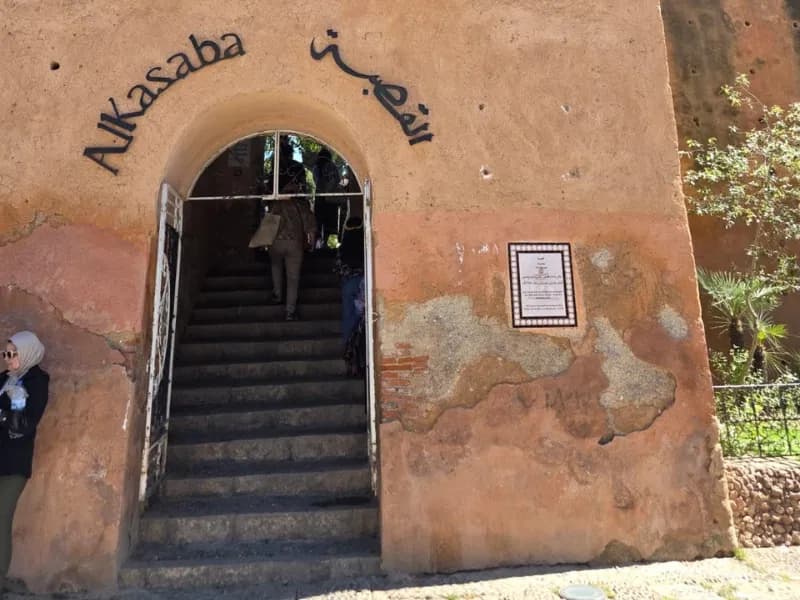 Arched entrance and stone stairway of the Kasbah in Chefchaouen